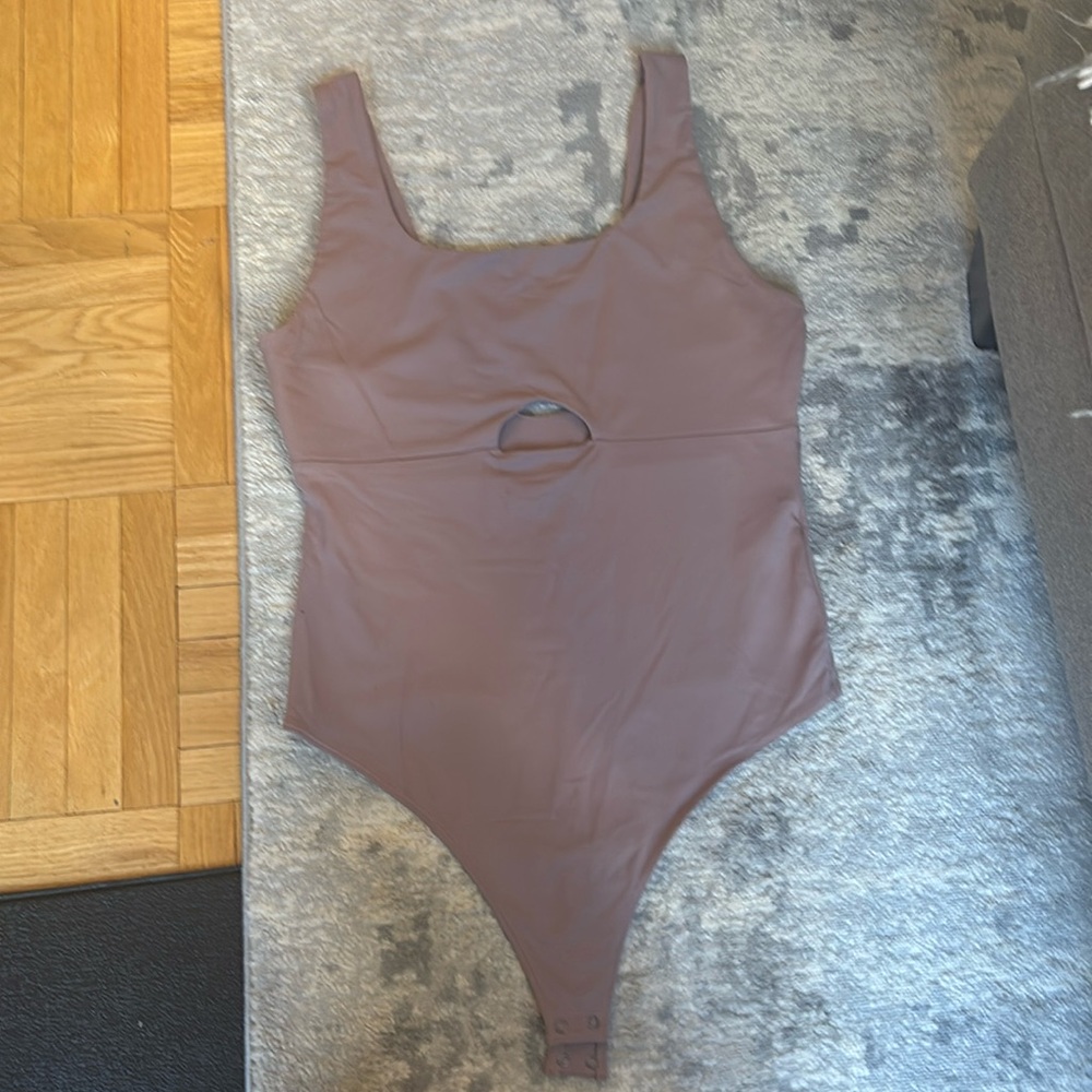 Abercrombie & Fitch Light Pink Bodysuit - Large 
Front cutout